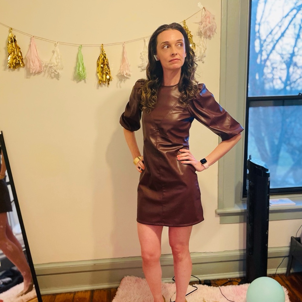 Vegan leather balloon sleeve mini dress. TOO CUTE
